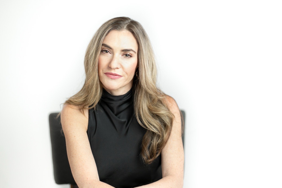 Katy Mickelson headshot, black top