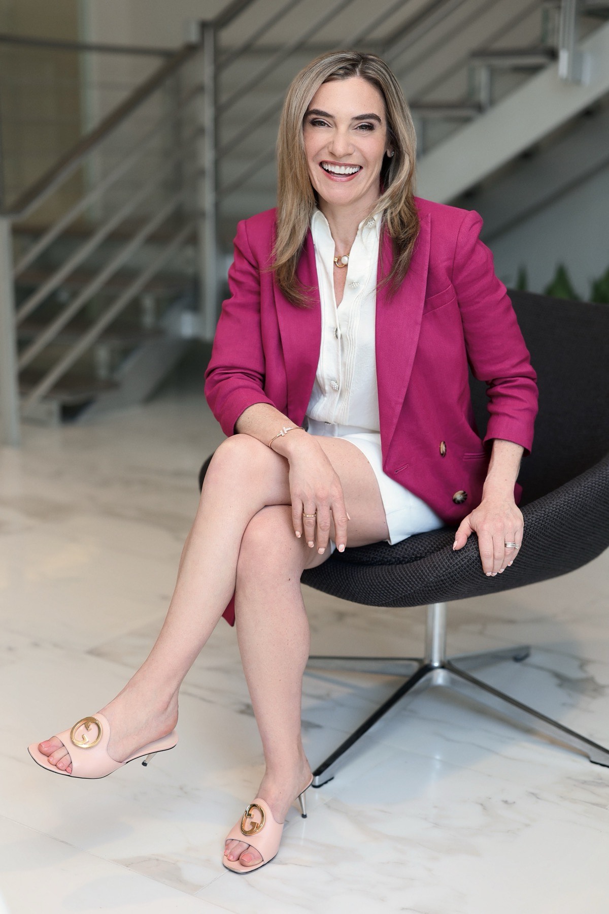 Katy Mickelson in pink blazer