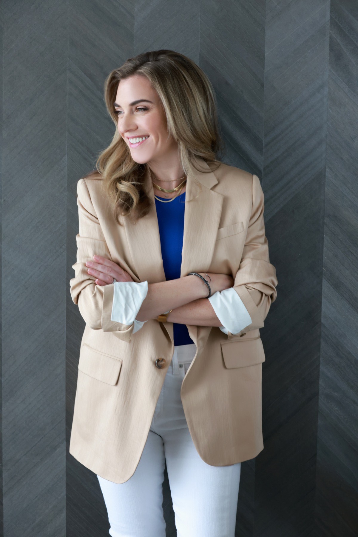 Katy Mickelson in office, smiling